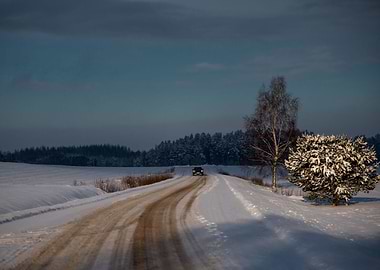 Car on snowy winter road