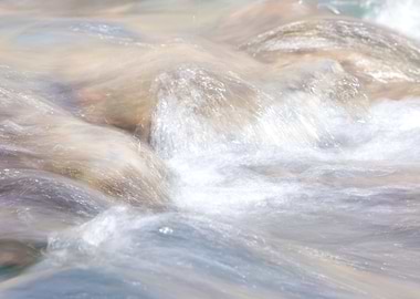 Water splashing over rocks