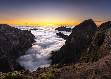 Sunset over the clouds