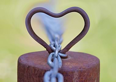 rusty heart chain on old w