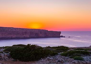 Seascape and sunset island