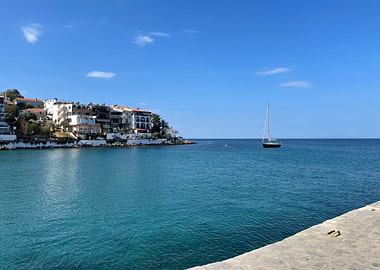 Greece: Sailboat in a Coastal Inlet