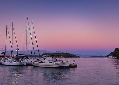 Boats from the port at sunset on the Greek island of Lefkada