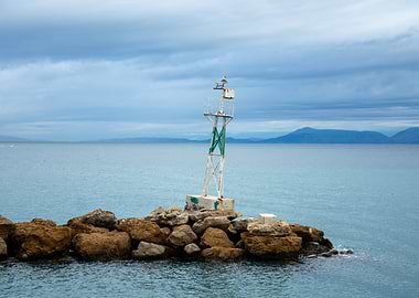 Lighthouse on Rocky Outcrop