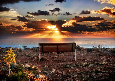 Sunset Infront of Lonely Bench on Cliffs in Malta