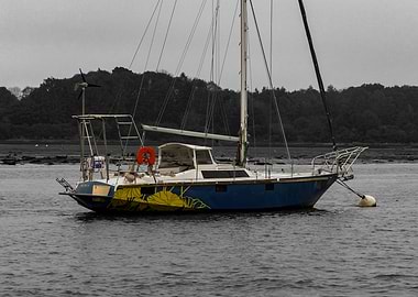 Blue Sailboat with Yellow Design