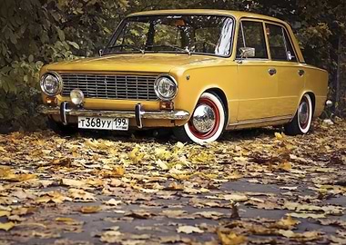 Vintage Yellow Car in Autumn