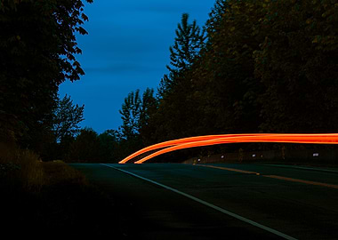 Night Road with Red Taillights