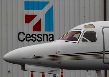 Cessna Logo Behind A Private Jet