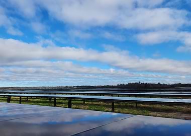 Solar Panels Under Blue Sky
