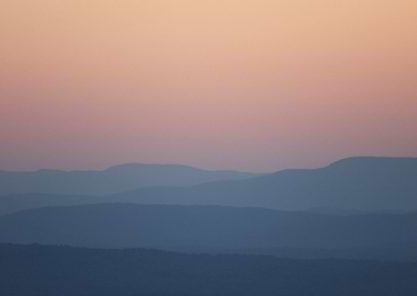 Silhouetted Mountains at Sunset