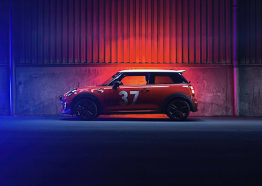 Red Mini Cooper Under Neon Lights