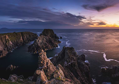Sunset Over Rugged Coastline