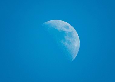 Moon in Blue Sky