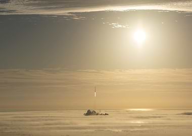 Rocket Launch Through Clouds