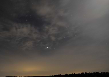 Night Sky with Stars and Clouds