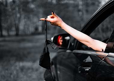 Black Bra Hanging From Car Window