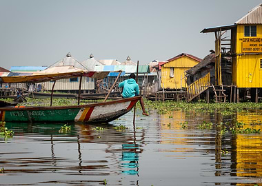 Man in Boat in Ganvié, Benin