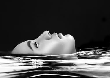 Woman Floating in Water