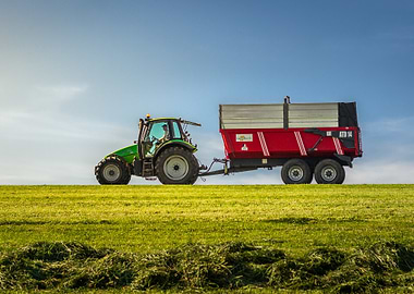 Green Tractor with Red Trailer