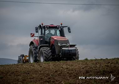 Red Tractor in Field