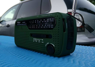 Outdoor Tunes: A Classic Portable Radio in Focus