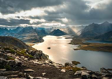 Rays of Light: A Scenic Rough Fjord Landscape with Sunbeams breaking the sky