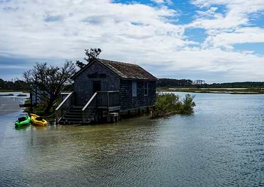 Wooden Cabin by the Water