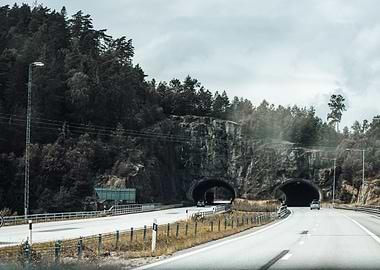 Tunnel Road Through Forest in Norway OU