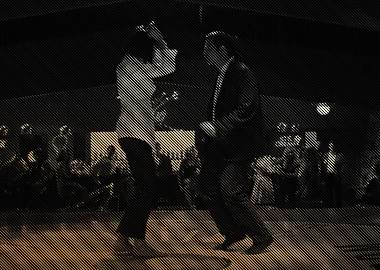 Silhouette of Two People Dancing