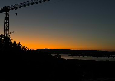 Sunset Silhouette with Crane