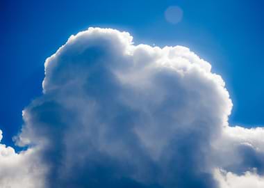 Fluffy White Cloud in Blue Sky