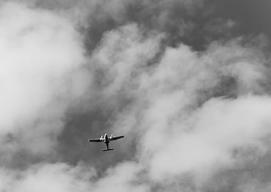 Airplane in Cloudy Sky