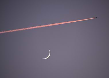 Crescent Moon and Airplane Trail