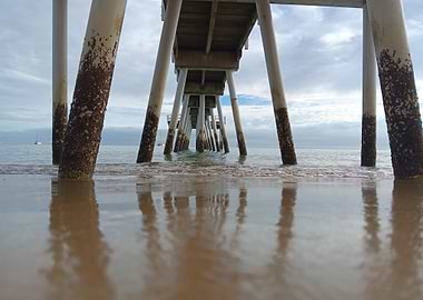 Pier Supports on Sandy Beach
