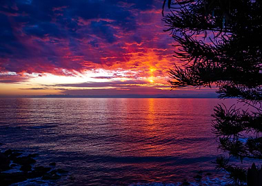 Fiery Sunset Over Ocean