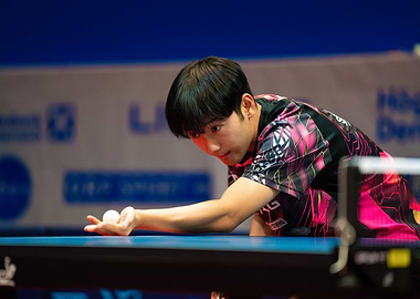 Table Tennis Player Serving