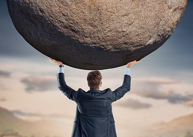 Businessman Lifting Boulder