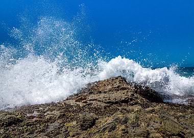 Ocean Wave Crashing on Rocks