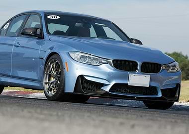 Blue BMW M3 on Track