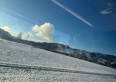 Snowy Landscape from Train Window