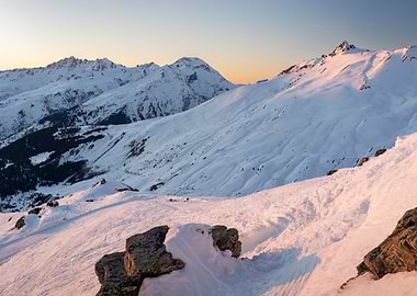 Snowy Mountain Peak at Sunset