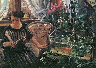 Woman Reading by Fish Tank
