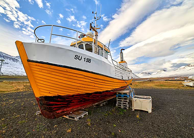 Yellow and White Fishing Boat in iceland