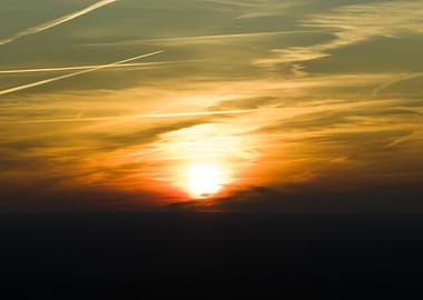 Sunset Sky with Contrails