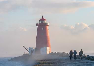 Lighthouse on a Misty Coast