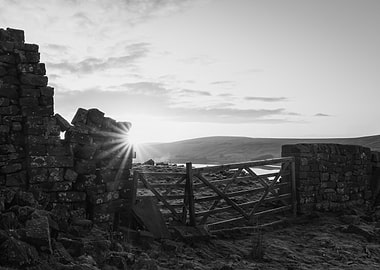 Sunrise Through A Stone Wall