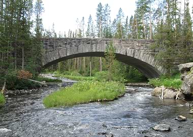Stone Bridge Over River