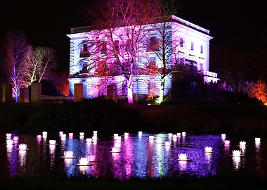 Illuminated Mansion and Pond