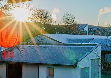Snowy Rooftops with Red Lantern